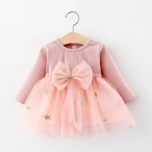 Robe rose à nœud papillon